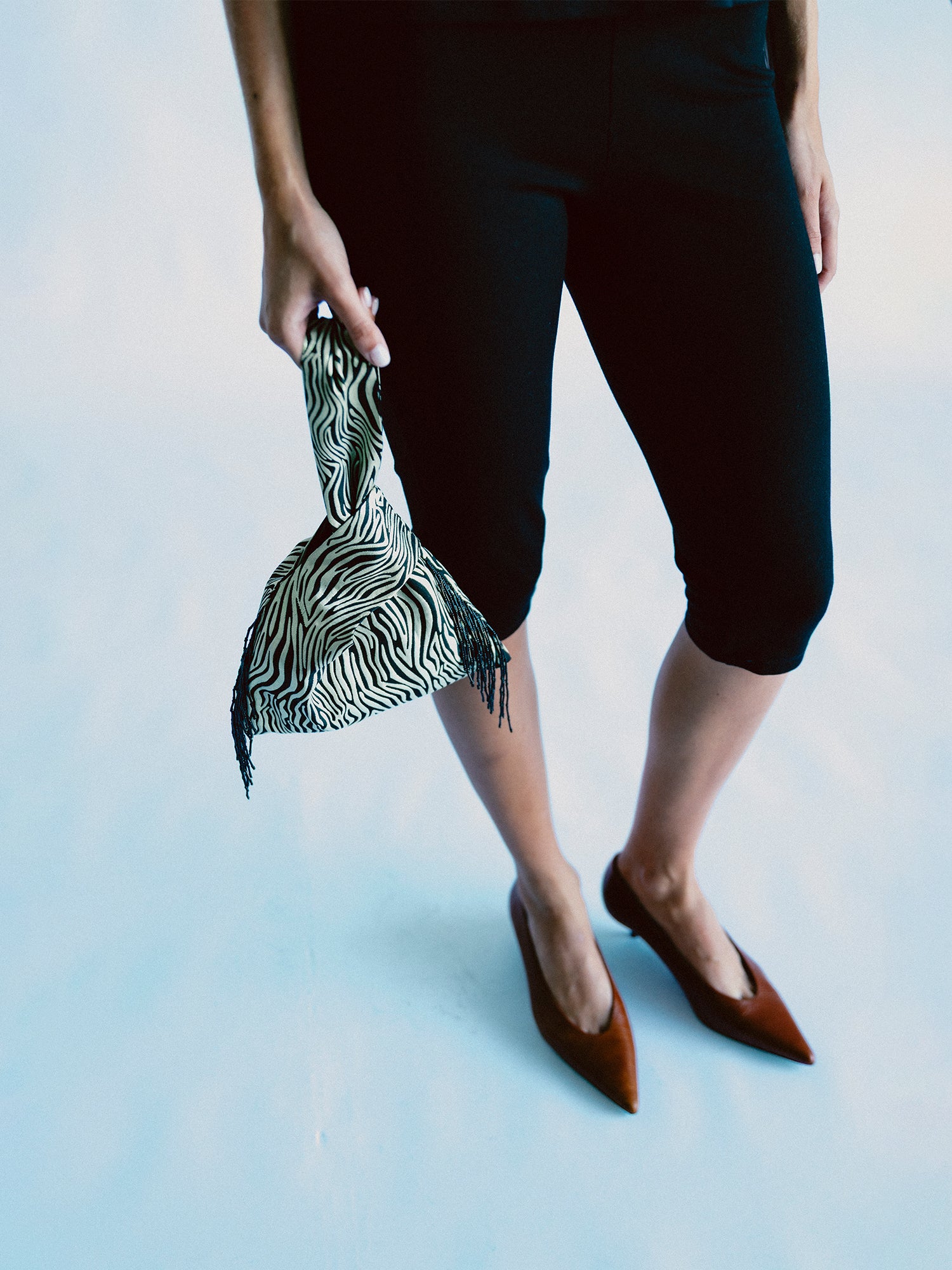 CHIC & COOL POUCH BAG - zebra print